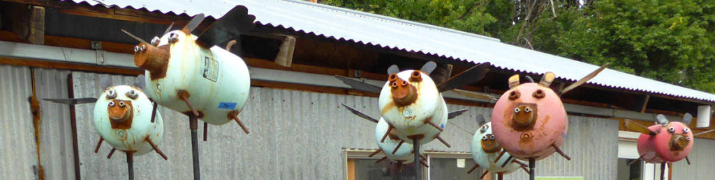 flying pigs yard art
